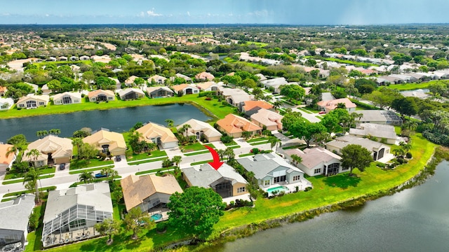 aerial view with a water view and a residential view