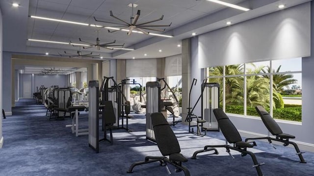 workout area featuring dark colored carpet and baseboards