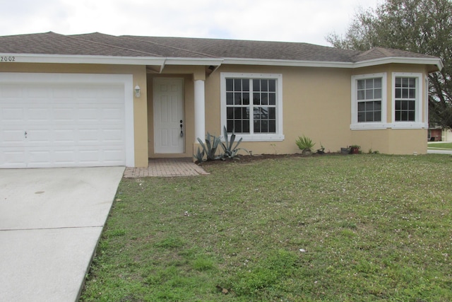 single story home featuring a garage, a front lawn, a shingled roof, and stucco siding