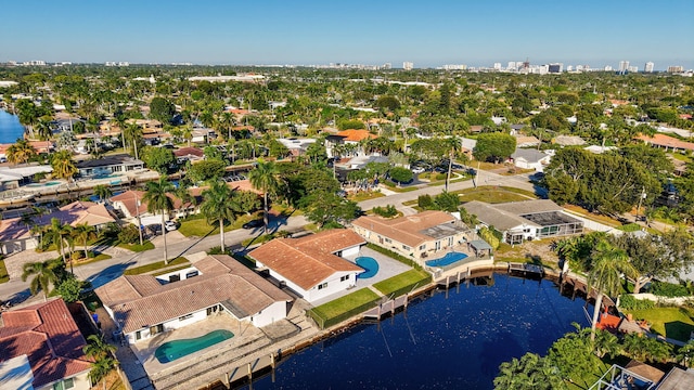 aerial view featuring a water view and a residential view