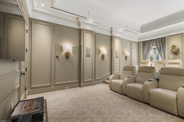 home theater featuring crown molding, light carpet, and a decorative wall