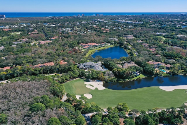 bird's eye view with golf course view and a water view