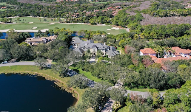 birds eye view of property featuring a water view and golf course view