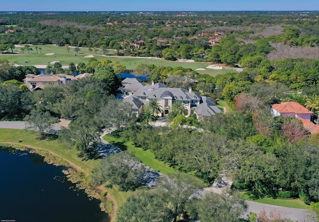 drone / aerial view with a water view and a residential view