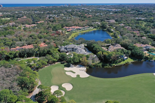 aerial view featuring a water view and golf course view