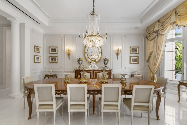 dining space featuring ornamental molding, a decorative wall, decorative columns, and an inviting chandelier