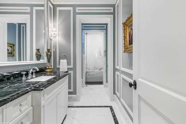 full bathroom with marble finish floor, a marble finish shower, and vanity