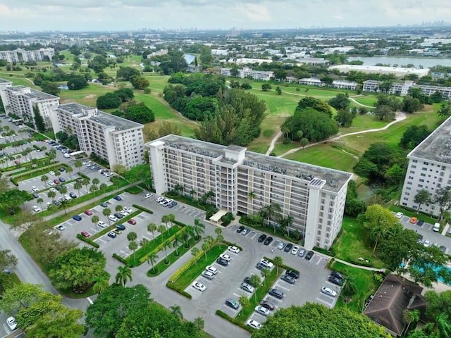 aerial view with a water view and a city view