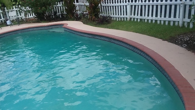 view of pool featuring fence and a fenced in pool