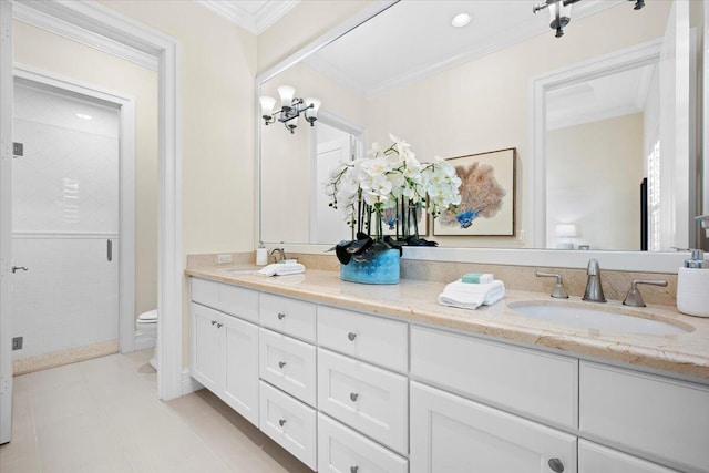 full bathroom featuring toilet, a sink, a shower stall, crown molding, and double vanity