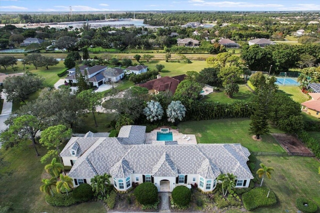 birds eye view of property with a residential view