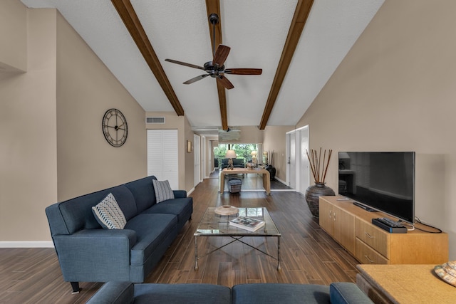 living area featuring vaulted ceiling with beams, ceiling fan, wood finished floors, visible vents, and baseboards