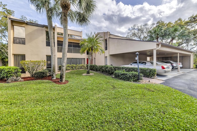 view of building exterior featuring a carport