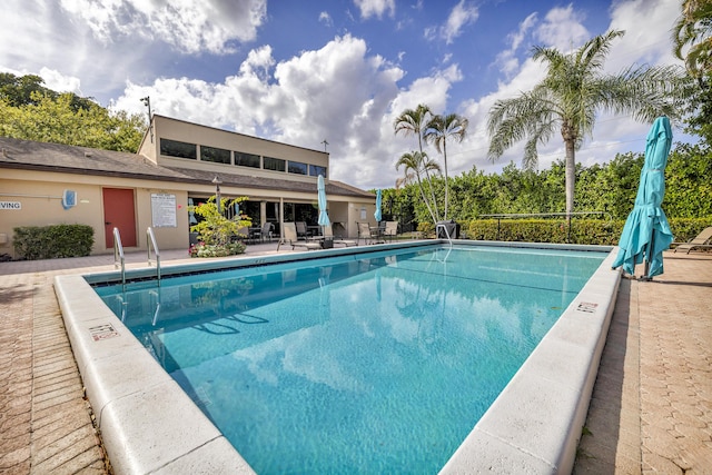 pool featuring a patio area