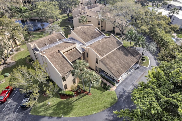 aerial view with a water view and a residential view