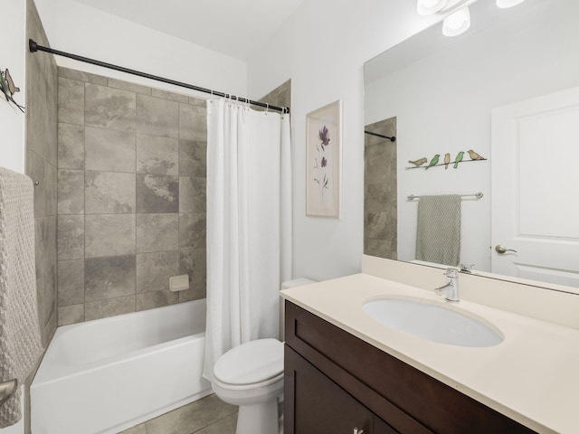 full bathroom featuring toilet, tile patterned floors, vanity, and shower / bath combination with curtain