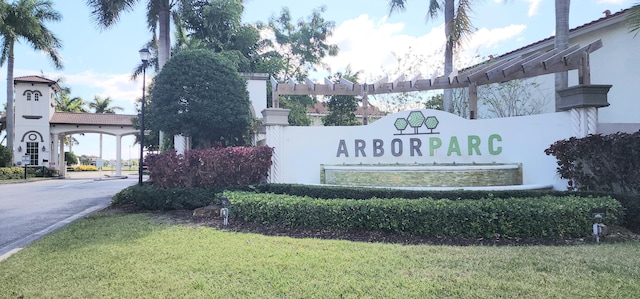 community sign with a yard