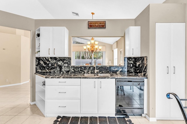 kitchen featuring a sink, dark stone counters, open shelves, and dishwasher