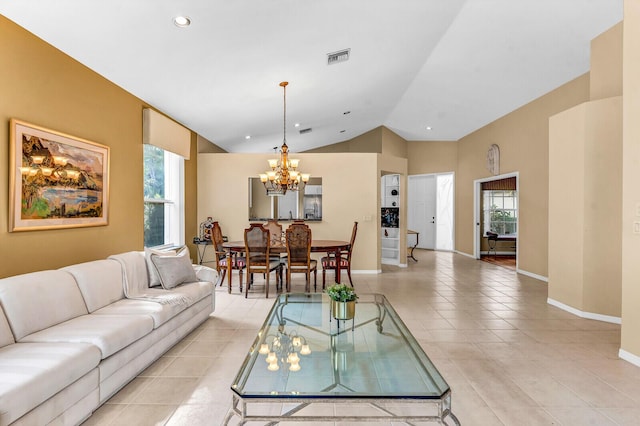 living room featuring baseboards, light tile patterned flooring, lofted ceiling, and a notable chandelier