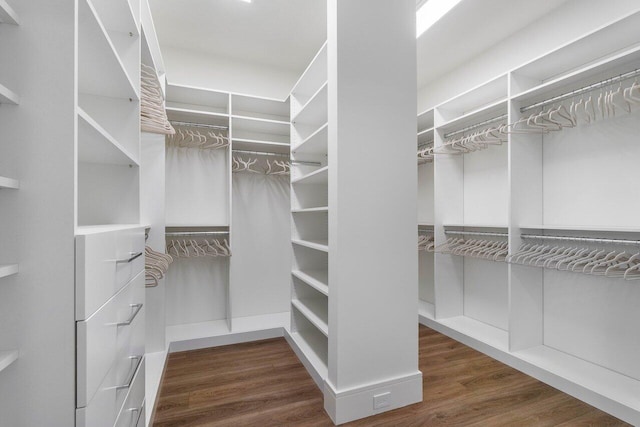 spacious closet with wood finished floors