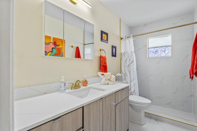 full bath featuring toilet, marble finish floor, a marble finish shower, and vanity