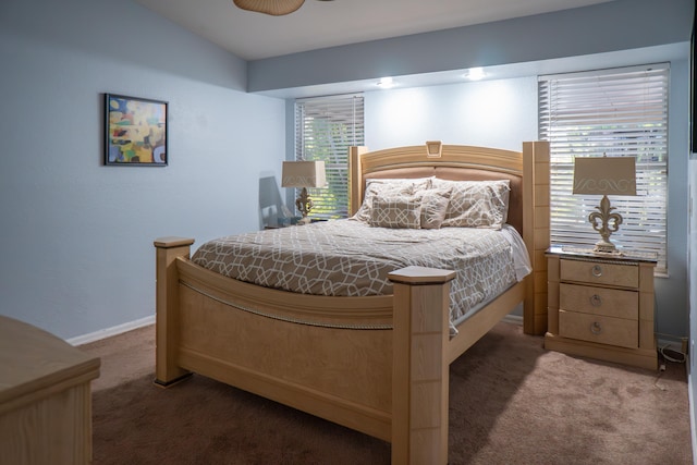bedroom featuring carpet floors and baseboards