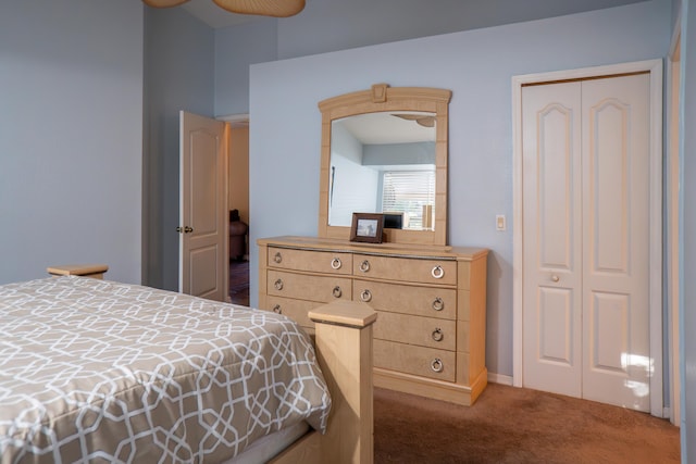 carpeted bedroom with a closet