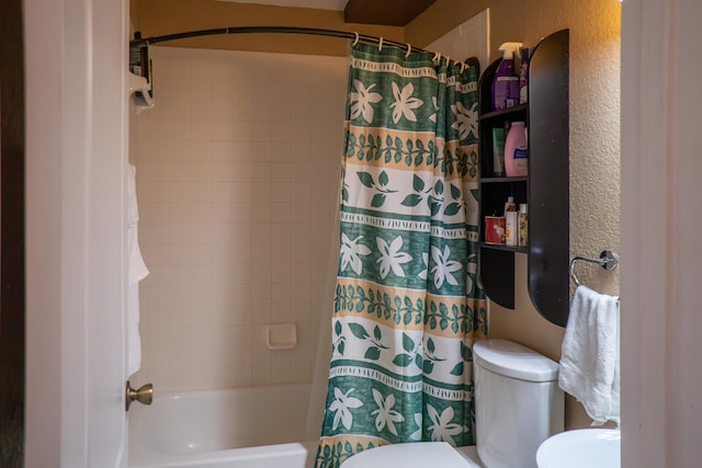 full bath with toilet, shower / bathtub combination with curtain, and a textured wall