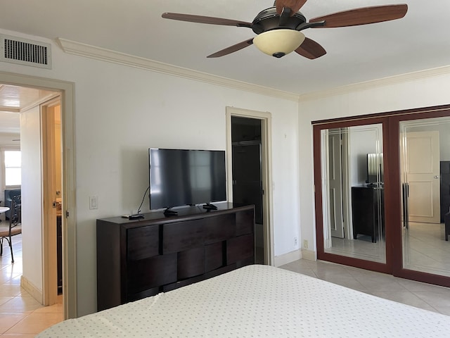 138 Monaco C, Delray Beach, FL 33446 - bedroom featuring ornamental molding, visible vents, baseboards, and light tile patterned floors