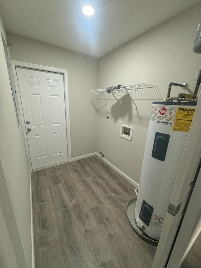 laundry room featuring laundry area, wood finished floors, water heater, washer hookup, and electric dryer hookup