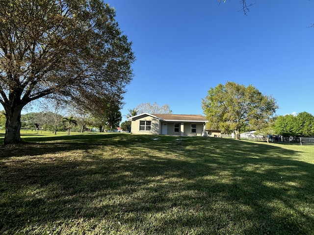 view of yard with fence