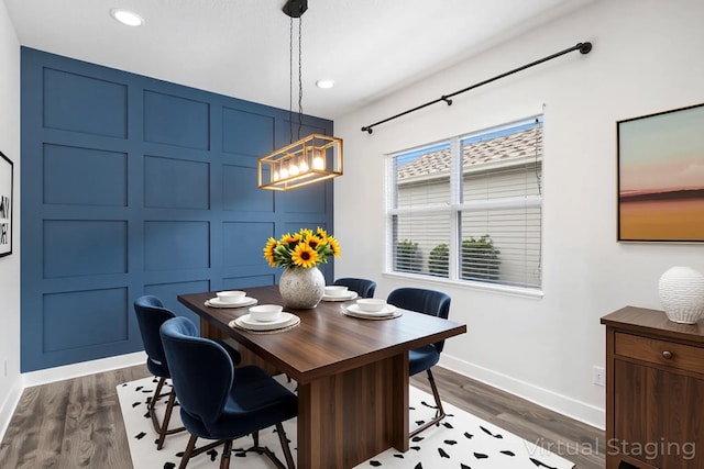15262 Goldfinch Cir, Westlake, FL 33470 - dining space featuring baseboards, a chandelier, dark wood-style flooring, and recessed lighting