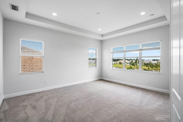 15262 Goldfinch Cir, Westlake, FL 33470 - carpeted empty room with baseboards, a raised ceiling, and recessed lighting