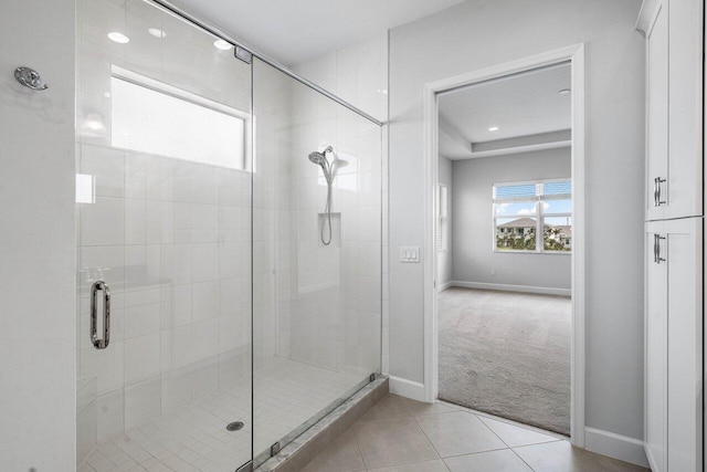 15262 Goldfinch Cir, Westlake, FL 33470 - bathroom featuring baseboards, a shower stall, and tile patterned flooring