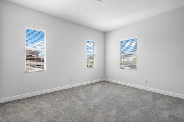 15262 Goldfinch Cir, Westlake, FL 33470 - carpeted empty room featuring baseboards
