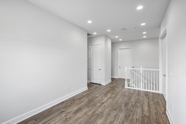 15262 Goldfinch Cir, Westlake, FL 33470 - empty room with wood finished floors, recessed lighting, and baseboards