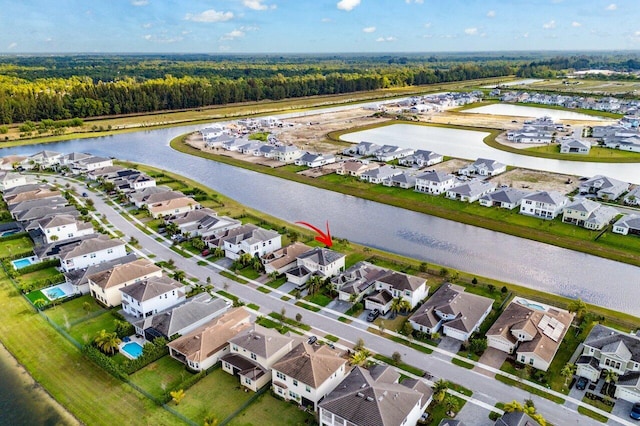 15262 Goldfinch Cir, Westlake, FL 33470 - aerial perspective of suburban area with a nearby body of water and a forest