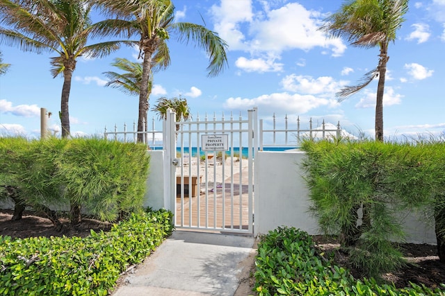 view of gate featuring fence