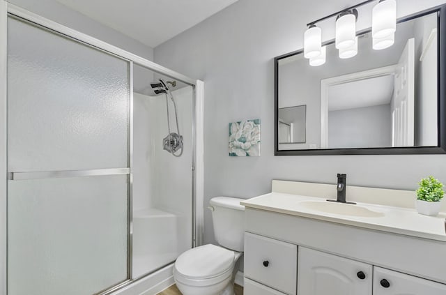 10821 N Military Trl Unit 2, Palm Beach Gardens, FL 33410 - full bath featuring a stall shower, vanity, and toilet