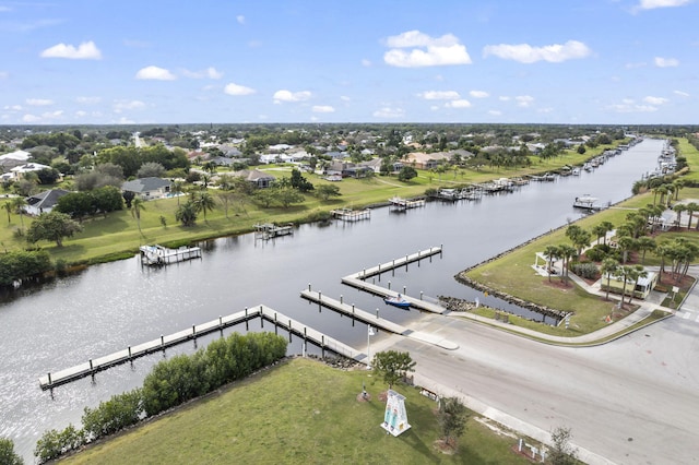 aerial view with a water view and a residential view