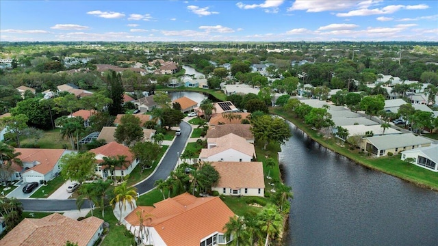 aerial view with a water view and a residential view