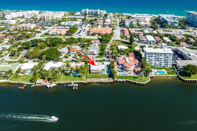 aerial view of property's location featuring a large body of water
