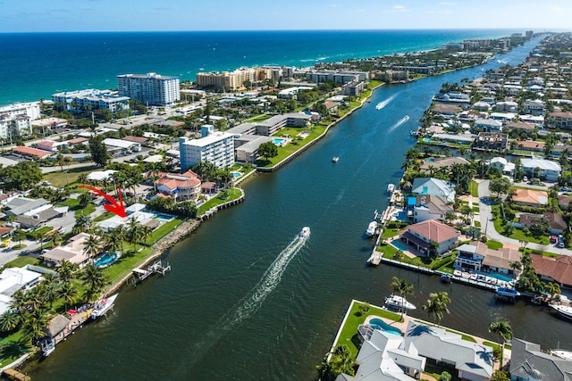 aerial view of property's location featuring a nearby body of water