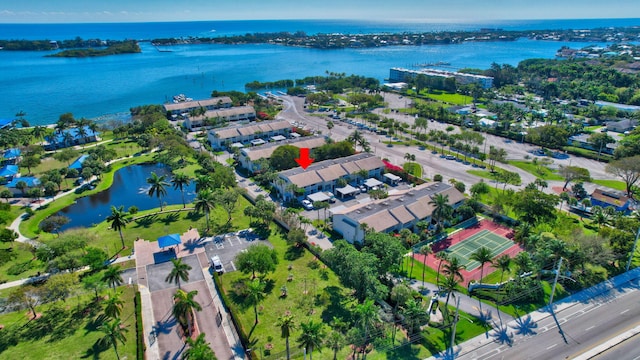 aerial view featuring a residential view and a water view