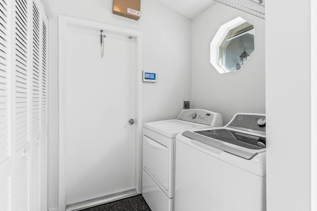 clothes washing area with laundry area and separate washer and dryer