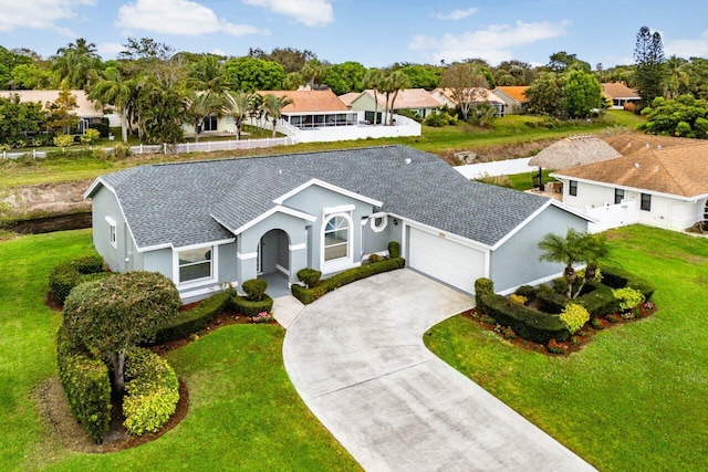 birds eye view of property with a residential view