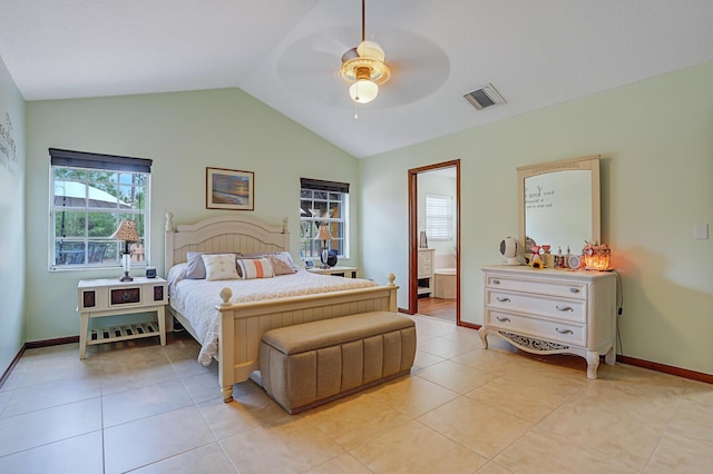 bedroom featuring vaulted ceiling, light tile patterned flooring, visible vents, and a ceiling fan