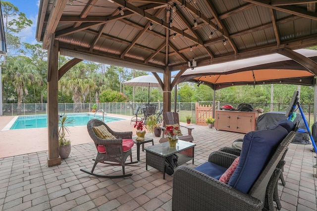 view of patio / terrace featuring fence and a gazebo