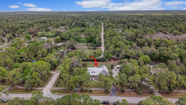 bird's eye view featuring a forest view