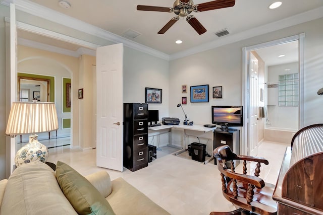 office area with arched walkways, recessed lighting, visible vents, ornamental molding, and ceiling fan